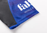 Close-up of the Blues Super Rugby 25/26 Replica Home Jersey by Classic Sportswear, showcasing a blue and black pattern with the partial words "fab" and "HOTELS &".