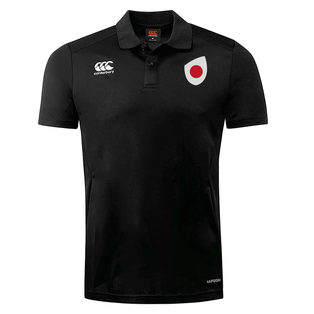 A black rugby shirt featuring a red circle EMB Canterbury Japan Shield Club Dry Polo logo on the right chest and the EMB Canterbury logo on the right collar, with the label "VapoDri" on the left chest.