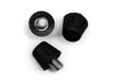 A pair of black plastic knobs on a white surface, perfect for artificial grass/turf pitches and soft ground boots. These WRS M6 Turf Studs by Starlai Corp are fitted with durable plastic studs that provide excellent traction.