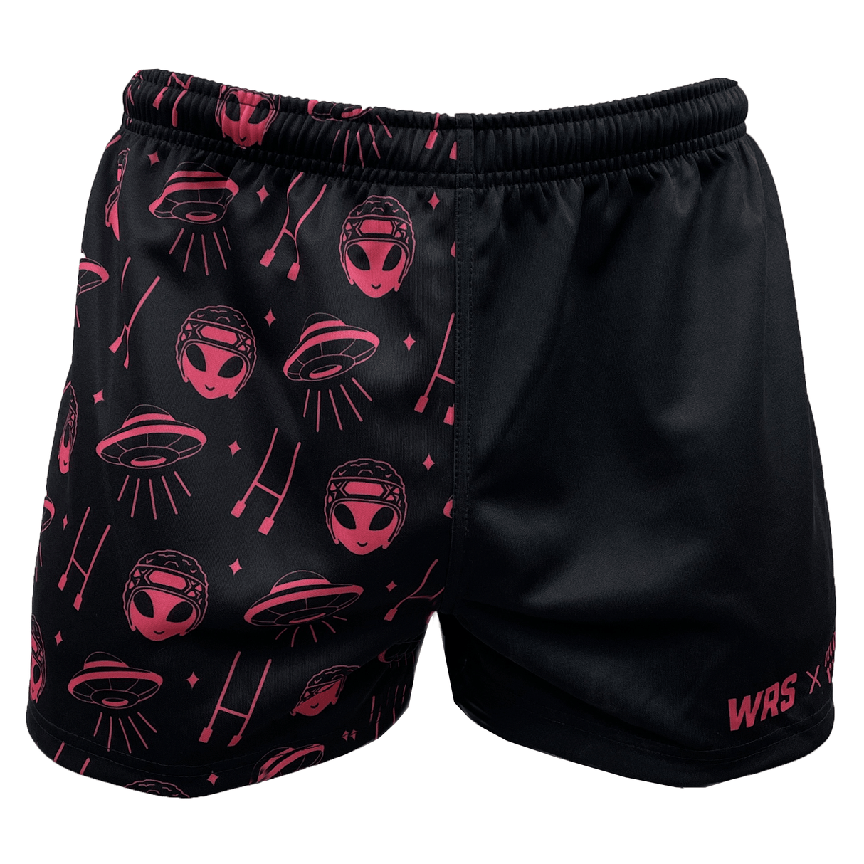 The Modish Rugger Limited Edition "We Scrum in Peace" Rugby Shorts, crafted by Modish Rugger, feature a unique combination of pink alien and spaceship patterns on one side and a sleek plain black design on the other, accented with "WAS" branding in striking pink lettering. These unisex shorts are perfect for those who dare to stand out with their stylish flair.