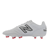 The New Balance Wide 442 V2 Pro FG cleats in white and silver boast a kangaroo leather upper, red studs, and the signature black New Balance logo on the side.