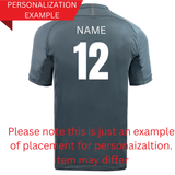 Back view of a P.Y.R.C. Canterbury Black Core Vapodri Rugby Singlet by WRS Canterbury in gray, featuring "NAME" and number 12. This moisture-wicking design exemplifies personalization; actual item may vary.