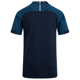 A navy blue short-sleeved Canterbury Vapodri Evader Jersey featuring a darker blue yoke and a light grey vertical stripe near the collar, shown from the back.