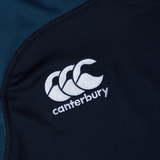 The Canterbury Vapodri Evader Jersey features navy blue fabric with a white embroidered "Canterbury" logo that showcases three stylized overlapping C's. It is equipped with VapoDri finish for optimal moisture-wicking technology, making it a perfect addition to the Canterbury Evader jersey collection.