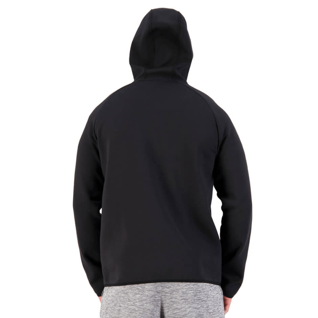 The back view of a man wearing a Canterbury Tempo Vapodri Full-Zip Hoodie featuring Canterbury branding.