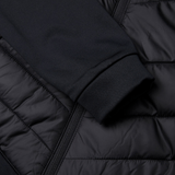 Close-up of the Canterbury Hybrid Jacket V2, featuring a black quilted design, visible sleeve, zipper detail, and advanced ThermoReg technology.