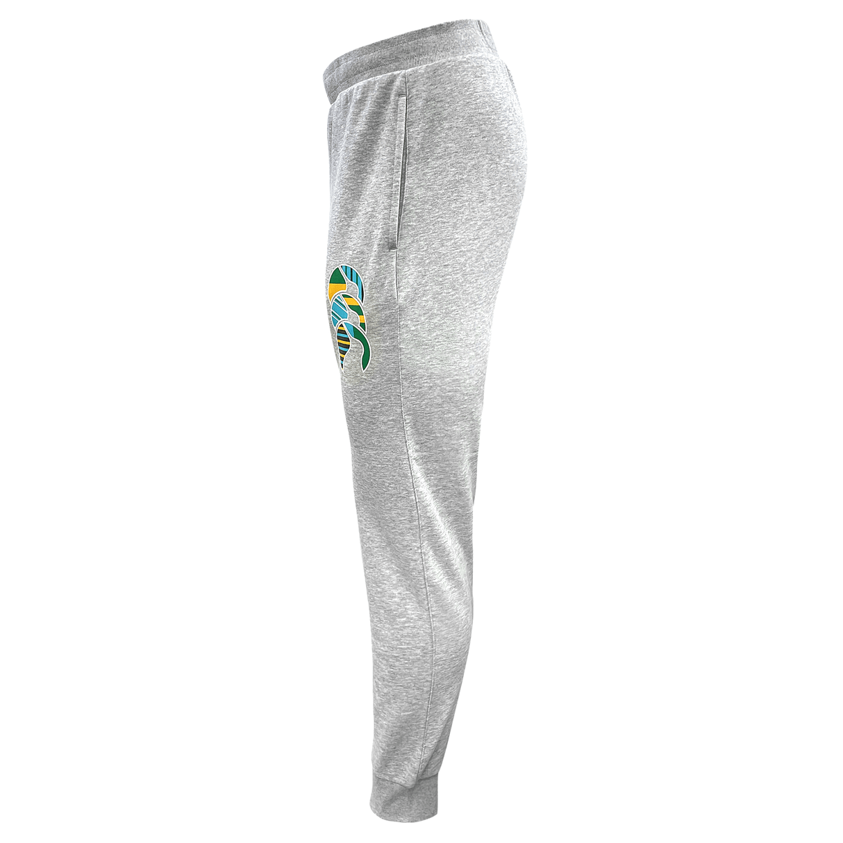 Side view of the Canterbury Uglies Everyday Taper Leg Pant in light gray, showcasing an abstract multicolored design on the left thigh. These taper-leg sweatpants by Canterbury feature an elasticated waistband with a drawstring, hip pockets, and elastic cuffs at the ankles.