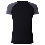 The Women's Canterbury Elite Training Tee features a black and gray raglan design, crafted from lightweight fabric. The short-sleeve athletic shirt is shown from the back and includes Vapodri technology for optimal performance.