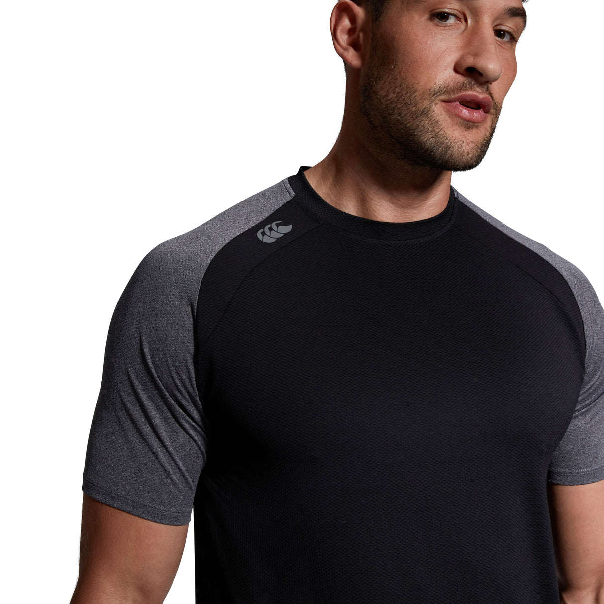 A man wearing a Canterbury Elite Training Tee.