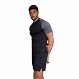 A man wearing a black Canterbury Elite Training Tee.