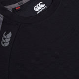 A close up of a black Canterbury Elite Training Tee with a grey Canterbury logo.