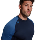 A man wearing a Canterbury Elite Training Tee by Canterbury.