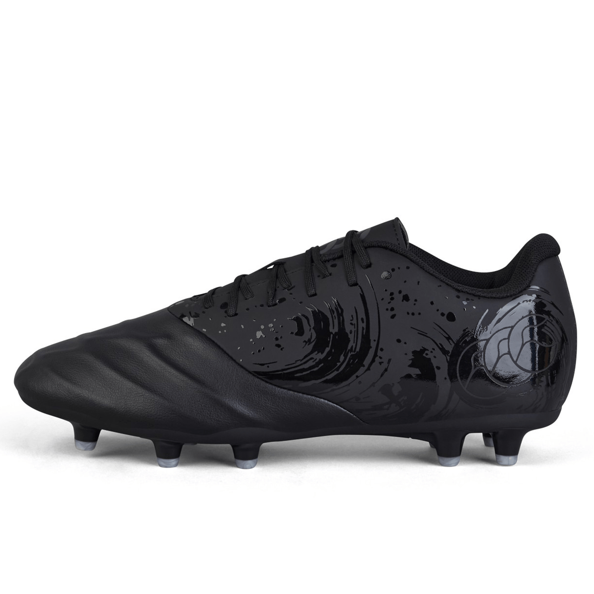 Introducing the Canterbury Phoenix Genesis Team FG - Black/Silver Metallic: a black soccer cleat featuring a glossy, wavy pattern on the heel, studs on the sole, and a synthetic leather forefoot. Designed for firm ground surfaces, it boasts a sleek and stylish look combined with top-tier performance for athletes.