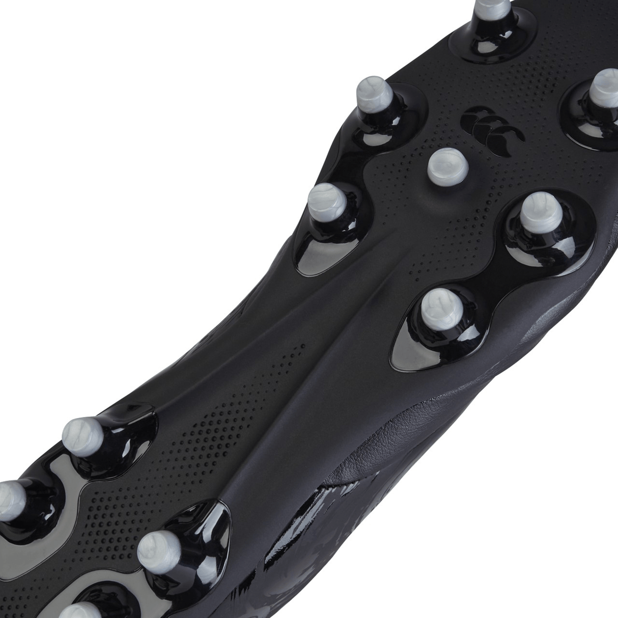 Close-up view of the underside of the Canterbury Phoenix Genesis Team FG - Black/Silver Metallic rugby boot, crafted with synthetic leather forefoot and featuring multiple metal studs for firm ground traction.