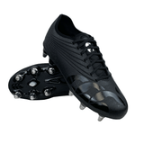 A pair of Canterbury Stampede Groundbreak Pro SG soccer cleats in Black/Silver Metallic, with one resting on top of the other, displayed on a white background, designed for optimal traction on soft ground and efficient power transfer.