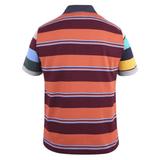 A man wearing a Canterbury Uglies Polo in orange and blue stripes.