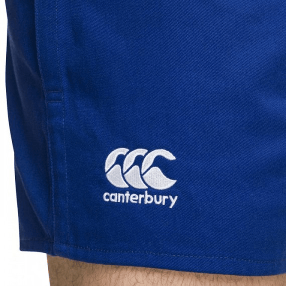 A close up of a person wearing Canterbury Classics Rugged Drill Shorts from Canterbury.