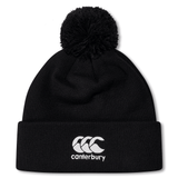 Check out our Just In collection: the Wales Shield Pom Pom Beanie by EMB Canterbury. This classic black beanie features a white "Canterbury" logo on the cuff, combining warmth with timeless elegance and a modern twist.