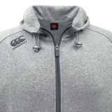 The Canterbury Tempo Vapodri Full-Zip Hoodie features Canterbury branding and a logo on the front. It is a grey hoodie with moisture-wicking properties.