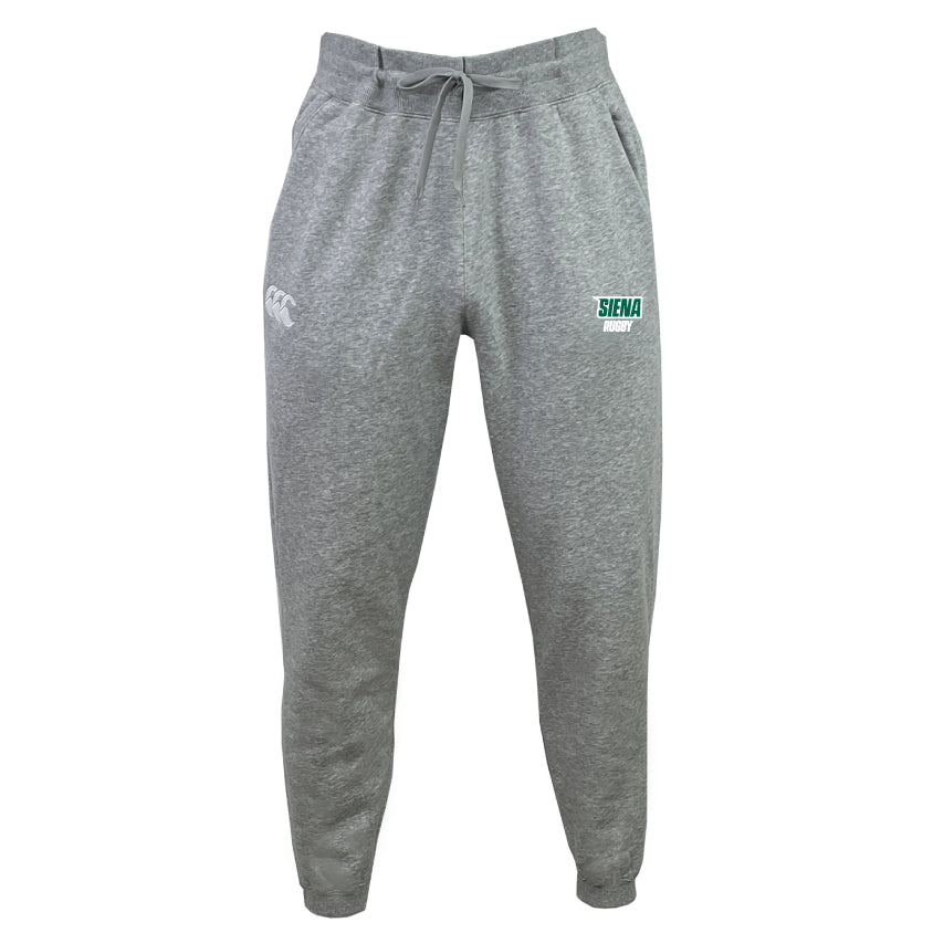 The Siena College Leisure Sweatpant by Canterbury offers comfort and style with cozy gray, recycled polyester, drawstring waist, and elastic cuffs. Featuring a white EMB Canterbury logo and green "Siena Rugby" text on the front.