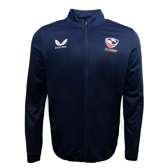 The USA Rugby Track Jacket by Castore, in navy blue, features a stylized bird logo and text on the left chest, alongside Castore's signature winged emblem on the right. Ideal for USA Rugby fans seeking both style and comfort.