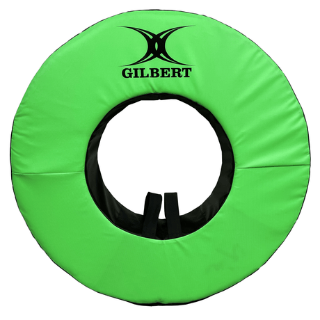 A Gilbert 40" Green Rugby Tackle Ring with the brand name "Hadar" printed on the top, perfect for practice drills.