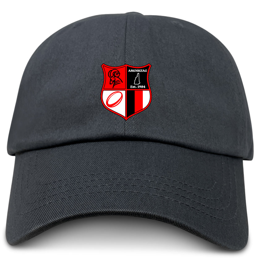 The Amoskeag Rugby Club Adult Low-Profile Cotton Twill Dad Cap by EMB Alpha Broder features a cotton twill construction with an embroidered red and black shield emblem that includes a ram, "Amoskeag," a triangle with "Est. 1984," and a rugby ball design for stylish detail.