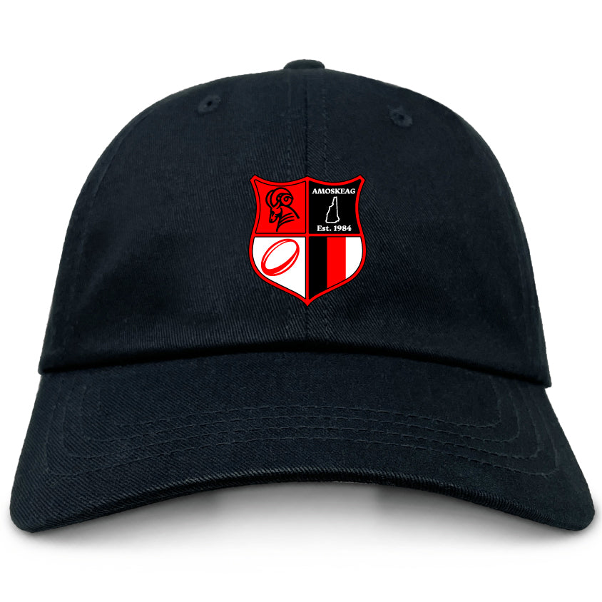 The EMB Alpha Broder Amoskeag Rugby Club cap features an embroidered red, white, and black shield with symbols and "Est. 1984" text. Made of premium cotton twill, this stylish black low-profile dad cap is the perfect accessory for a timeless look.