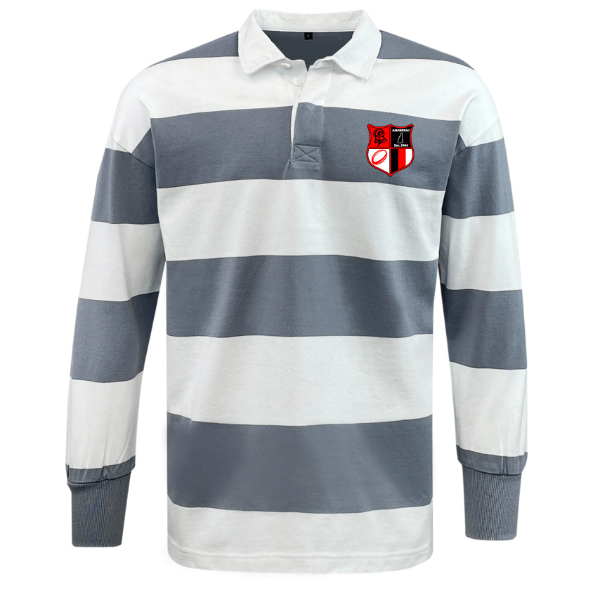 The Amoskeag Rugby Club Classic Long Sleeve Hooped Rugby Jersey by EMB Mudoo combines classic comfort and timeless style with its gray and white stripes, long sleeves, and a collar. A chest patch featuring two red lions over a shield adds a nostalgic touch.