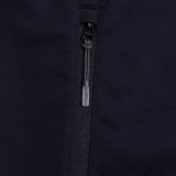 Close-up of a black zipper on the Canterbury Elite Windstopper Jacket, showing the metal puller with a logo engraved.