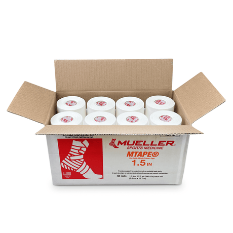 A box labeled with Mueller branding contains 32 rolls of Mueller Mtape Case-32 Tape Rolls, featuring prominent product labels and logos on the exterior.