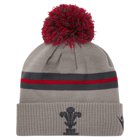 Gray pull on hat with red and gray pom pom atop, dark gray stripe with red center around middle and WRU dark gray embroidered on the cuff.