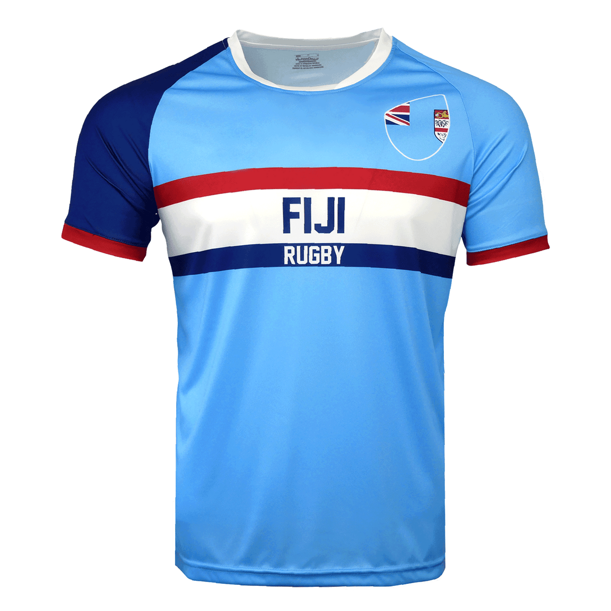 Light blue jersey with round neck and short sleeves. Right shoulder and sleeve in dark blue trimmed in red. Left sleeve in light blue trimmed in red. Fiji partial flags on upper left chest with Fiji Rugby in the center of red and dark blue horizontal lines.