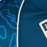 Detail image of blue rugby polo fabric.