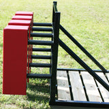 Close Up Side View of Red Scrum Pads on Black Sled w/ Wood Platform