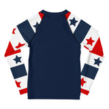 Back of a Long sleeve rash guard with a red, white and blue stars and stripes design on the sleeves, and a navy body.