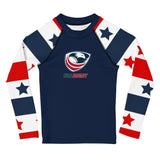 Long sleeve rash guard with a red, white and blue stars and stripes design on the sleeves, a navy body and a USA Rugby logo center front.