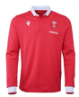 The Wales Long Sleeve Home Polo 22/23 by Macron is a red, long-sleeve sports jersey that features a white collar and cuffs. The jersey showcases a logo with a white feather emblem and the "WRU" letters, as well as the "CAZOO" brand mark on the left chest.