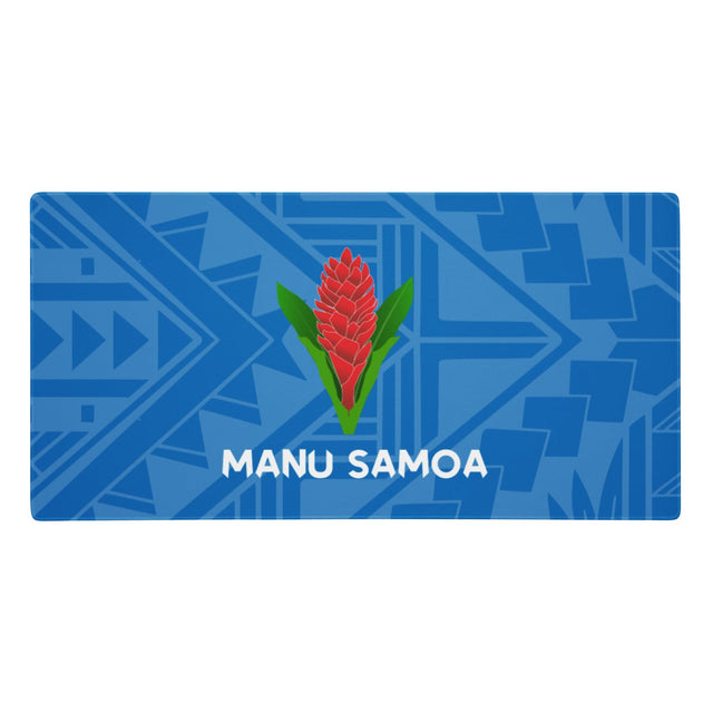 Gaming mouse pad with a blue on blue geometric design and Manu Samoa logo.