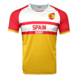 White round neck short sleeve jersey with red shoulders and arm sleeves trimmed in red. Flag of Spain on upper left shoulder, red stripes in the center with Spain in red and Rugby below in white in the red stripe. Torso is yellow.