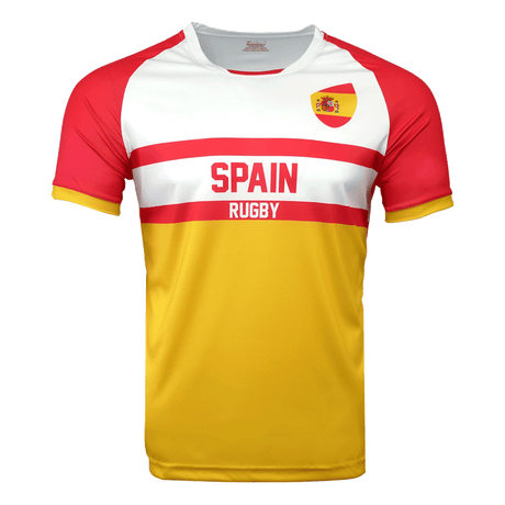 White round neck short sleeve jersey with red shoulders and arm sleeves trimmed in red. Flag of Spain on upper left shoulder, red stripes in the center with Spain in red and Rugby below in white in the red stripe. Torso is yellow.