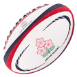 A Gilbert rugby ball with the Japan Replica Ball logo on it.