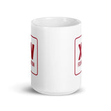 A white XV Foundation Mug with a red x on it.