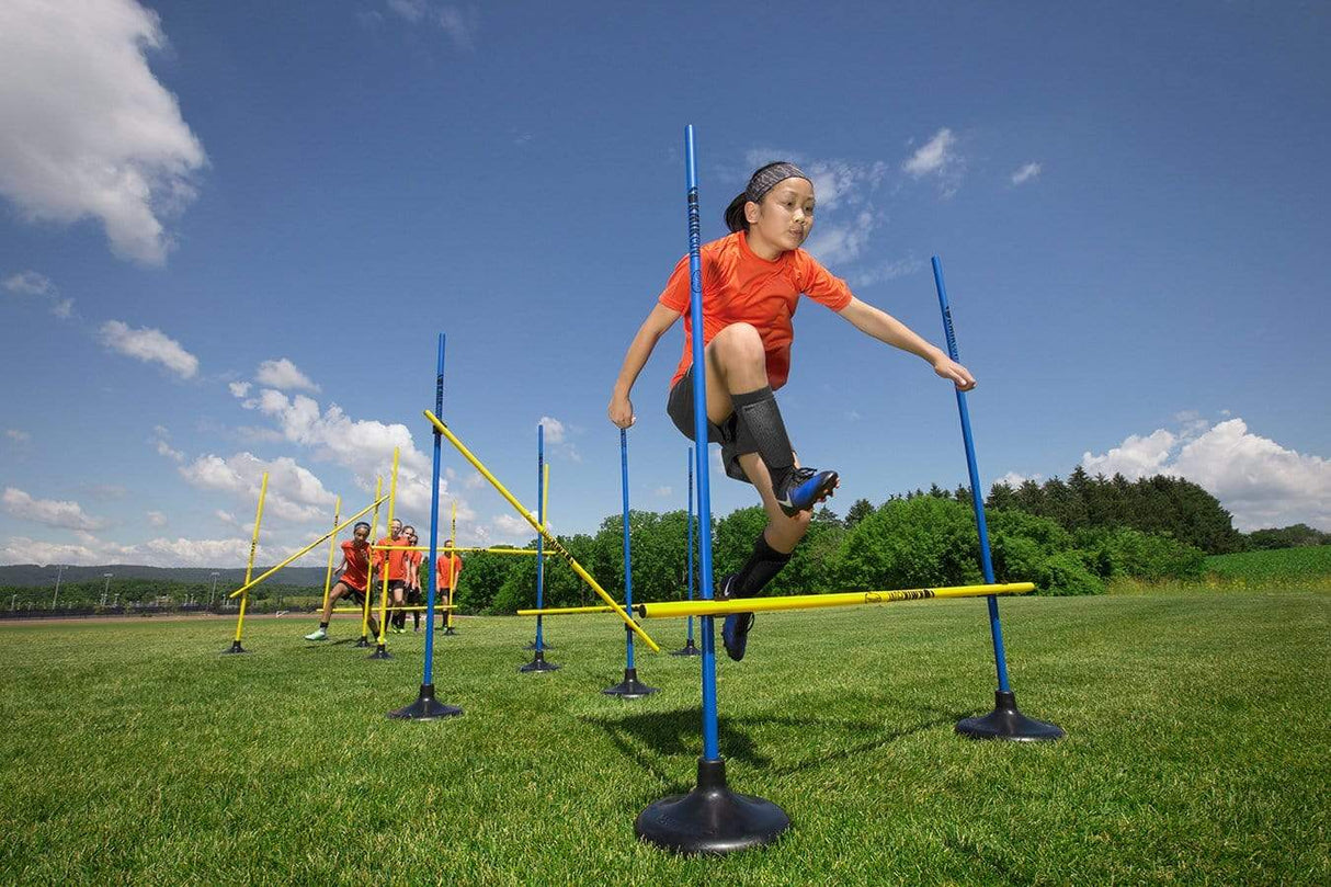 Youth Athletes Demonstrating Use of Blue & Yellow Hurdle Sticks