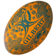 Orange Gilbert Wallabies Rugby ball with green logo and indigenous designs.