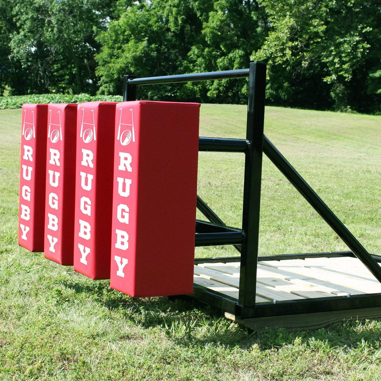 Front Side Angle View of 4 Red Pads on Scrum Sled with RUGBY On Each