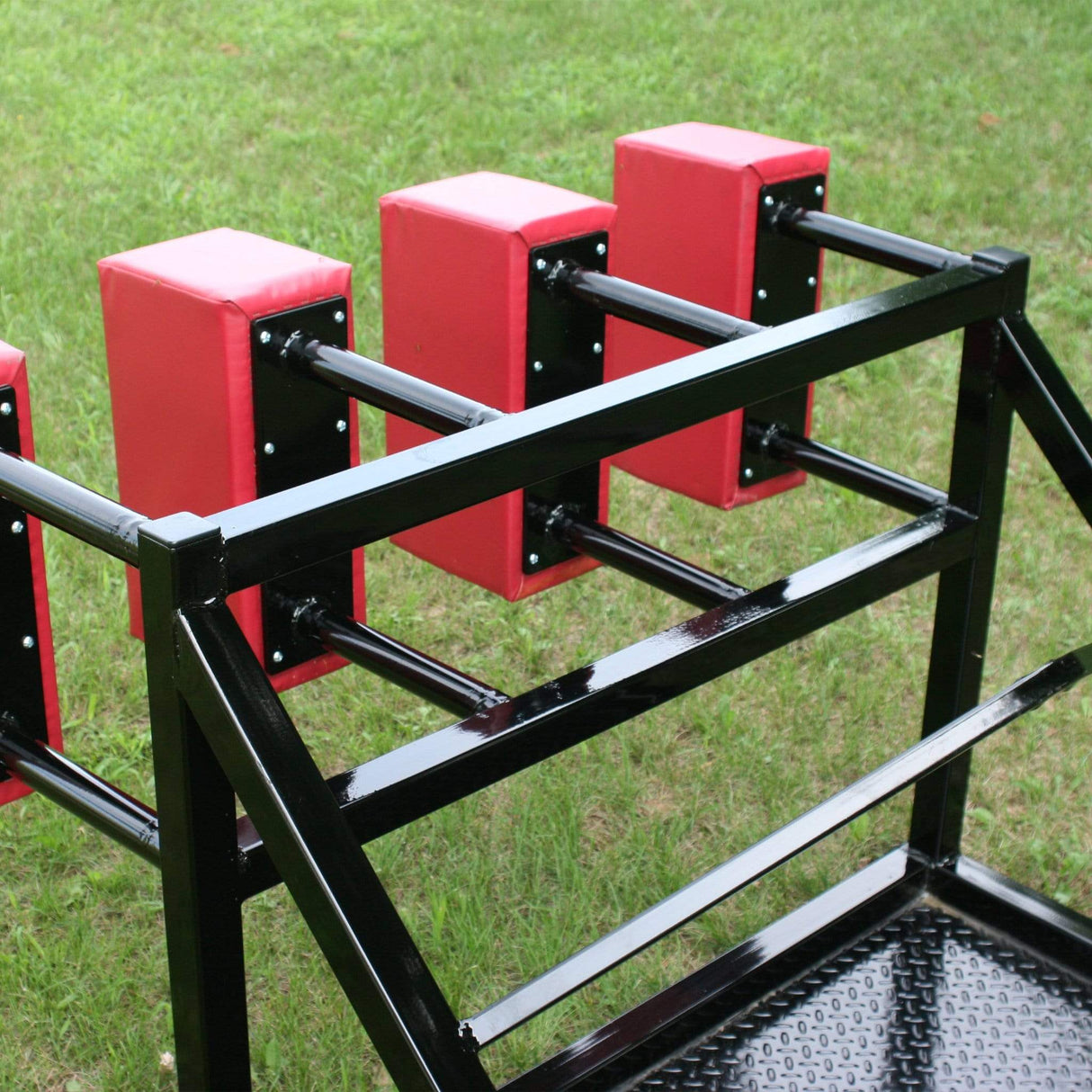 View From Behind of Red Foam Pads Mounted On Black Steel Sled